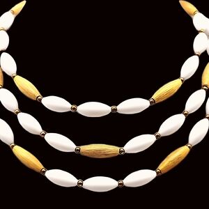 Elegant Gold and White Necklace